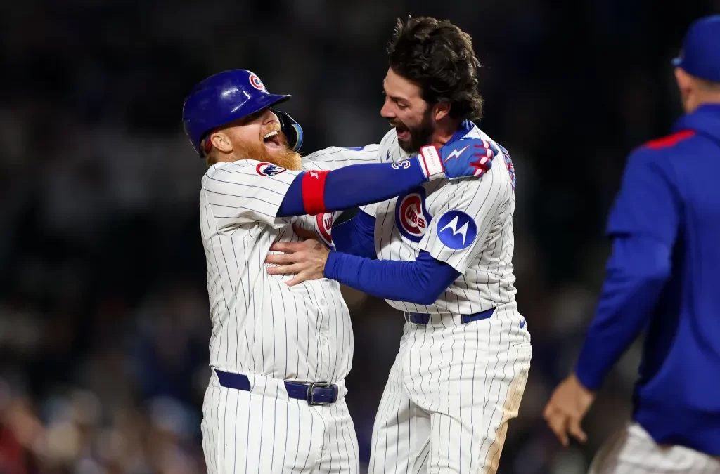 Justin and Dansby strangling each other